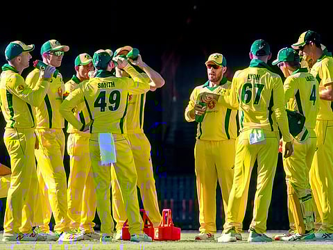 Australian players take a break during the second of three warm-up cricket matches between New Zealand and Australia in Brisbane on May 8, 2019.