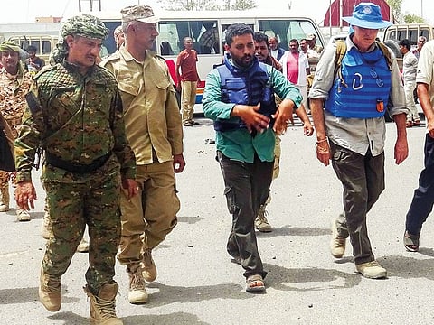 Members of the World Food Programme visit the Red Sea mills warehouse in the Yemeni port city of Hodeida last Sunday. The World Food Programme said yesterday it gained access to vital food aid on the outskirts of Yemen’s flashpoint city of Hodeida a month after postponing its mission for security reasons.