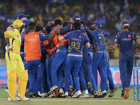 Members of Mumbai Indians celebrate their win in the VIVO IPL T20 cricket final match between Mumbai Indians and Chennai Super Kings in Hyderabad, on Sunday, May 12, 2019.