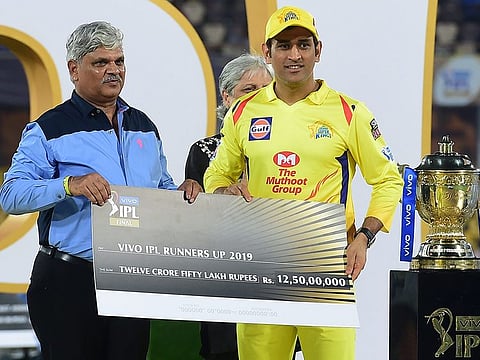 Chennai Super Kings (CSK) skipper MS Dhoni receives runner-up cash award of Rs 12.5 crores at the prize distributing ceremony of the Indian Premier League 2019 Final cricket match at Rajiv Gandhi International Cricket Stadium in Hyderabad, Monday, May 13, 2019.