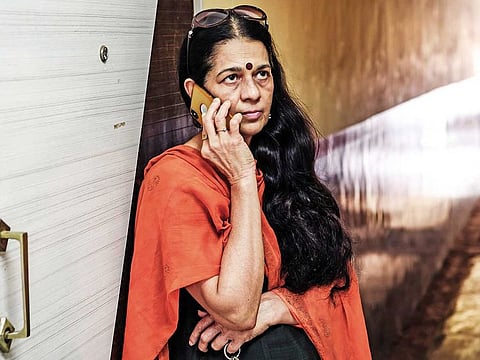 Detective Rajani Pandit speaks with a client at her office in Mumbai. India's marathon general election is a busy time for Rajani Pandit, one of the country's most famous private detectives who has blazed a trail for women in a male-dominated profession.