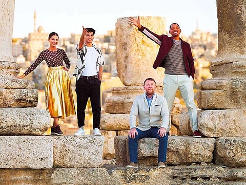 ‘Aladdin’ cast members Naomi Scott, Mena Massoud and Will Smith, with director Guy Ritchie