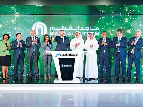 Alain Bejjani, CEO of Majid Al Futtaim Holdings, rings the market-opening bell in the presence of Eisa Kazim, governor of the Dubai International Financial Centre (DIFC) and chairman of Dubai Islamic Economy Development Centre (DIEDC), Hamed Ali, chief executive of Nasdaq Dubai, and members of Majid Al Futtaim’s leadership team.