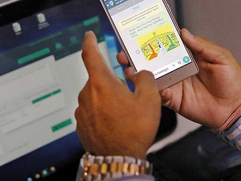 Delhi resident Rohitash Repswal, a digital marketer, checks a message he sent using a software tool that automats the process of sending messages to WhatsApp users.