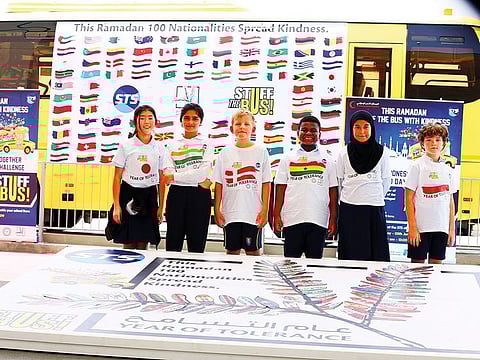 STS’ ‘Stuff the Bus with Kindness’ campaign features 100 students of 100 nationalities.