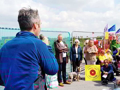 Dr Jem Bennell addresses an anti-fracking protest at the main gates of a fracking operation outside Blackpool, northwest England.
