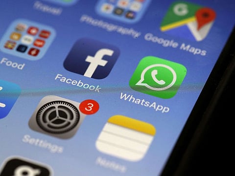 The WhatsApp messaging app is displayed on an Apple iPhone.