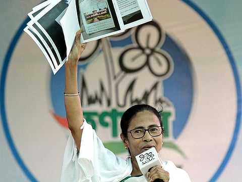 Trinamool Congress leader and Chief Minister of West Bengal state Mamata Banerjee addresses an election rally at Anchana in Mathurapur.