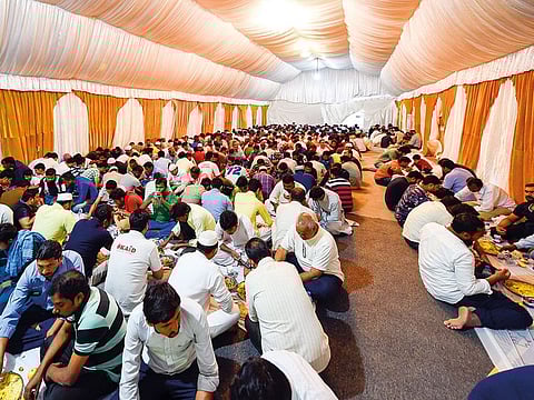 People have Iftar near Al Noor Mosque in Sharjah.