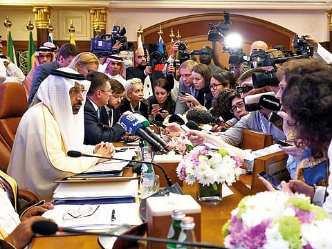 Saudi Energy Minister Khalid Al Falih speaks to the press during the one-day Opec+ group meeting in Jeddah yesterday. Major crude producers met yesterday to discuss how to stabilise a volatile oil market amid rising US-Iran tensions in the Gulf, which threaten to disrupt supply.