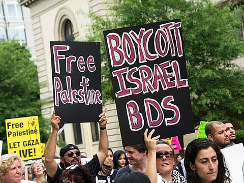 In this file picture, protesters voice support for the BDS movement.