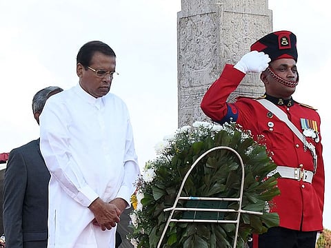 Sri Lankan President Maithripala Sirisena (L)