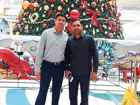 Indian poet Amaan Haider (left) with Afghanistan allrounder Mohammad Nabi.