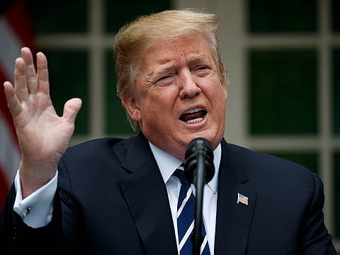 President Donald Trump delivers a statement in the Rose Garden of the White House, Wednesday, May 22, 2019, in Washington.
