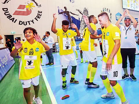 Fohood Zabeel celebrate after they defeated Dubai Police 8-6 in the semi-finals in NAS Futsal Championship.