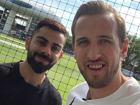 Harry Kane and Virat Kohli pose at Lord's in London.