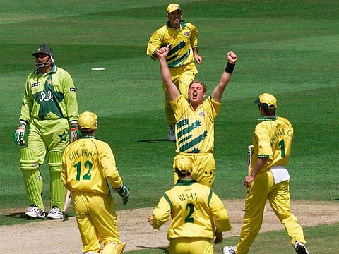 In this June 20, 1999 file photo, Australia's Shane Warne celebrates taking the wicket of Pakistan's Ijaz Ahmed during the final of the Cricket World Cup between Australia and Pakistan at Lords in London.