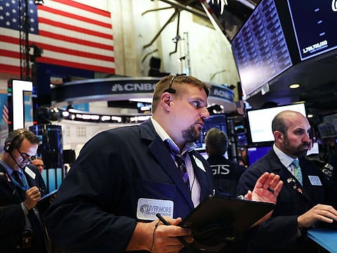 Traders work on the floor of the New York Stock Exchange (NYSE) in New York City.