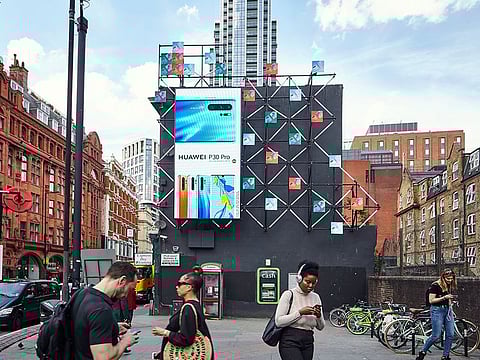 A Huawei billboard in London.