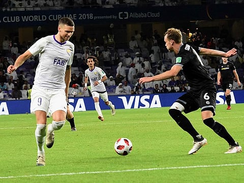 Marcus Berg of Al Ain and Taylor Schrijvers of Wellington are seen fight for the ball during their FIFA Club World Cup UAE 2018 at Shaikh Hazza Bin Zayed Al Nahyan Stadium in Al Ain.