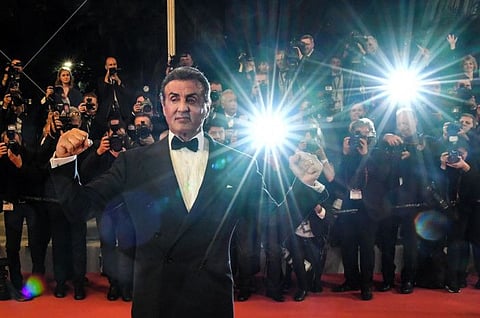 US actor Sylvester Stallone poses as he arrives for the screening of "Homage to Sylvester Stallone - Rambo : First Blood" at the 72nd edition of the Cannes Film Festival in Cannes, southern France, on May 24, 2019.