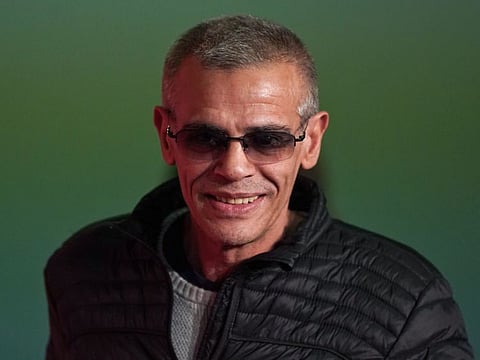 French-Tunisian film director Abdellatif Kechiche arrive to attend a press conference for the film "Mektoub, My Love : Intermezzo" at the 72nd edition of the Cannes Film Festival in Cannes, southern France, on May 24, 2019. / AFP / Sébastien BERDA