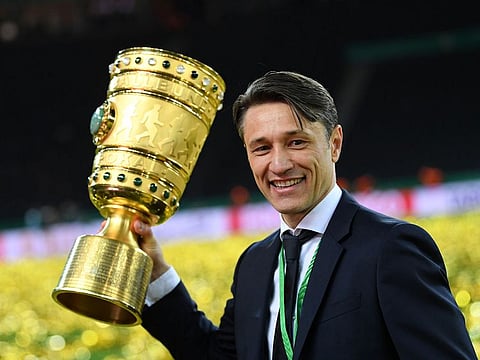 Bayern Munich coach Niko Kovac celebrates winning the DFB Cup.