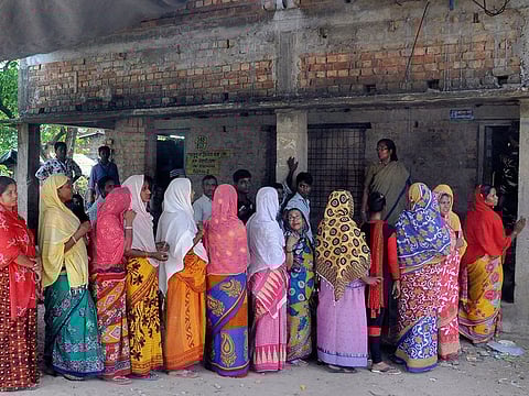 A Sunday, May 19, 2019 file photo of voters queuing outside a polling station to cast their vote, in South 24 Parganas district of West Bengal.