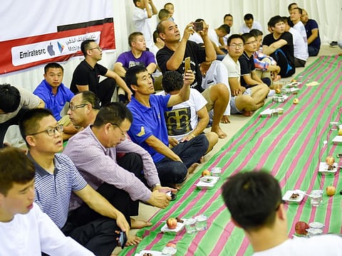 Chinese Muslims at an Iftar by Chinese Business Council with the support of Consulate General of People’s Republic of China and Red Crescent at International City, in Dubai.