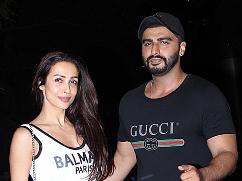Mumbai: Actors Arjun Kapoor and Malaika Arora at the screening of upcoming film "India's Most Wanted" in Mumbai, on May 23, 2019. (Photo: IANS)