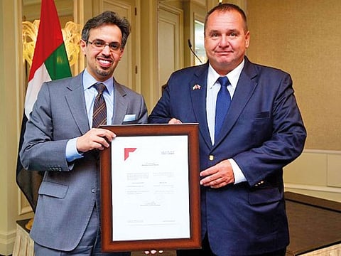 Dr Pavel Foubik receives the CBC Licence from Hamad Buamim, President and CEO, Dubai Chamber of Commerce and Industry