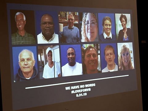 A slide of the victims in the May 31, 2019 mass shooting at a Virginia, Beach, Virginia, municipal building is shown during a press conference.