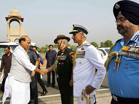 Union Defence Minister Rajnath Singh being received by Chief of the Army Staff General Bipin Rawat during his visit to National War Memorial, in New Delhi. Also seen in the picture are Chief of the Naval Staff Admiral Karambir Singh and Chief of the Air Staff Air Chief Marshal BS Dhanoa.