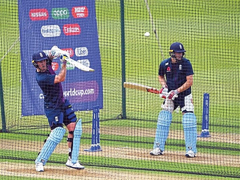 England’s Jason Roy (left) and Chris Woakes take part in the nets during their final practice session. The World Cup favourites take on Pakistan at Trent Bridge.