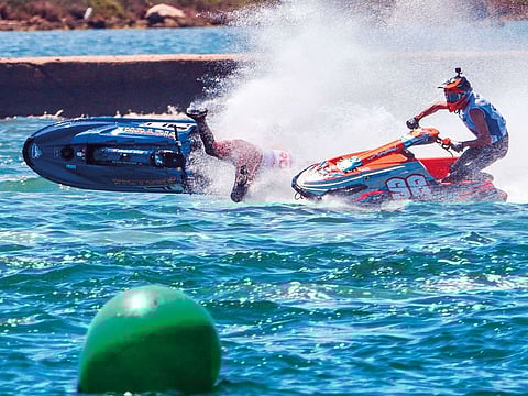 Kevin Reiterer (left) is taken out by a chasing Quinten Bossche in the opening moto of the Grand Prix of Italy.