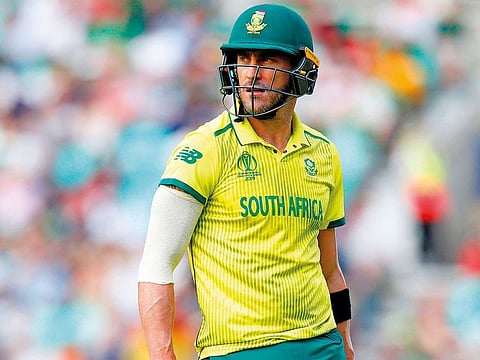 South Africa’s Faf du Plessis walks back to the pavilion after his dismissal for 62 runs during the group stage match against Bangladesh at The Oval on Sunday.