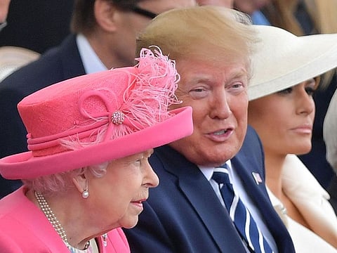 Britain's Queen Elizabeth II (L), US President Donald Trump and US First Lady Melania Trump attend an event to commemorate the 75th anniversary of the D-Day landings, in Portsmouth, southern England.