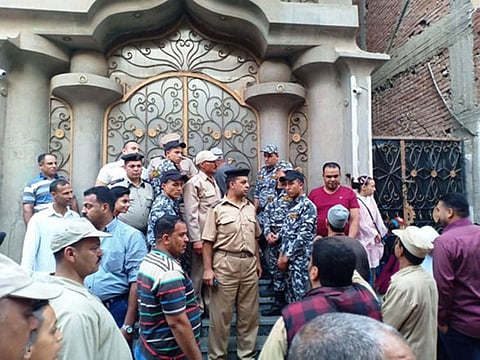 Security forces fend off enthused fans in Mohammad Salah's hometwon.