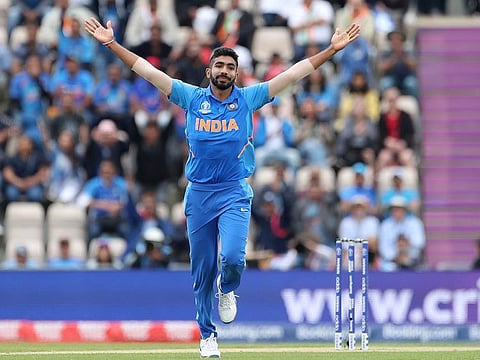 India's Jasprit Bumrah celebrates the dismissal of South Africa's Hashim Amla.
