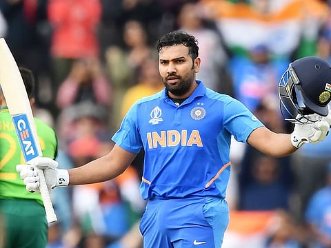 India's Rohit Sharma celebrates reaching his century during the 2019 Cricket World Cup group stage match between South Africa and India at the Rose Bowl in Southampton, on June 5, 2019.