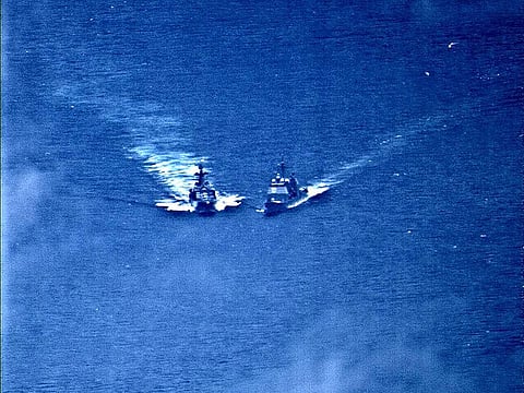 A surveillance photo shows the Russian naval destroyer Udaloy making what the U.S. Navy describes as an unsafe maneuver against the Ticonderoga-class guided-missile cruiser USS Chancellorsville in the Philippine Sea June 7, 2019.