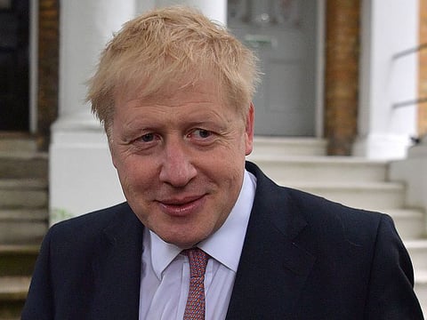 Conservative MP Boris Johnson leaves a house in London.
