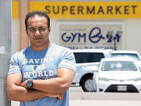 Mr Sajith, who lost money, in front of Gym 24 in Ras Al Khor, Dubai