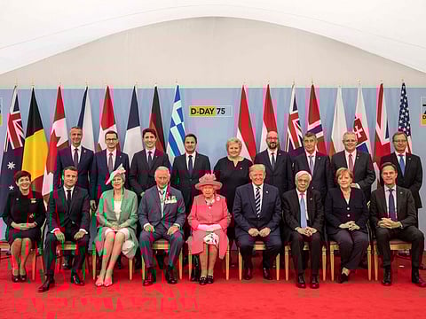 Top leaders including French President Emmanuel Macron, Britain's Prime Minister Theresa May, Britain's Prince Charles, Prince of Wales, Queen Elizabeth II, US President Donald Trump, during an event to commemorate the 75th anniversary of the D-Day landings. US President Donald Trump, Queen Elizabeth II and 300 veterans gathered on the south coast of England for a poignant ceremony.