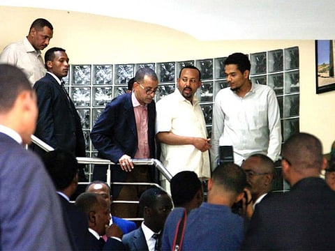 Ethiopia's Prime Minister Abiy Ahmed (2nd-R) meeting a delegation of the Alliance of Freedom and Change in the Ethiopian embassy in Khartoum