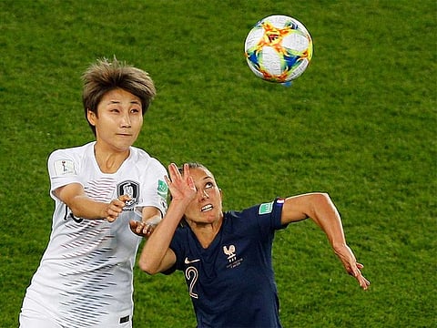 Action between France and Korea in women's World Cup in Paris on Friday.