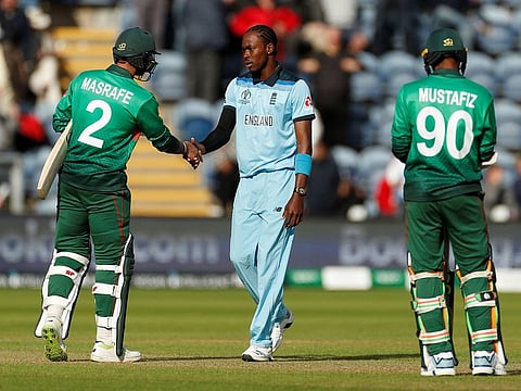 England's Jofra Archer shakes hands with Bangladesh's Mashrafe Mortaza after the match