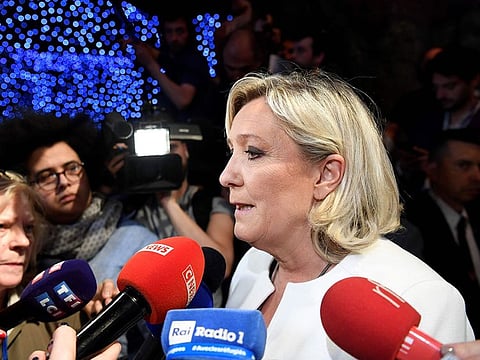 French far-right Rassemblement National (RN) President Marine Le Pen speaks to the press