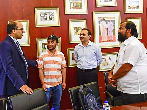 Vipul and Vibha Kant Sharma with Captain Ayyappan Swaminathan and crew member Rajib Ali who were part of sailors group which got stranded on a vessel off the UAE coast.