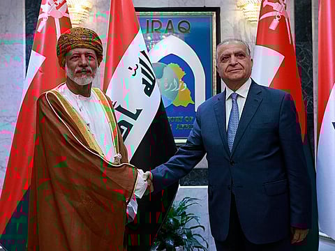 Yousuf Bin Alawi with Iraqi foreign minister Mohammed Alhakim